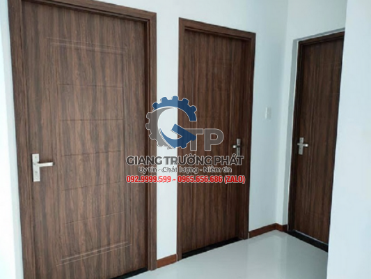 Cửa nhôm nguyên tấm vân gỗ đẹp giá rẻ thi công lắp đặt tại Vũng Tàu