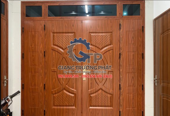 Cửa nhôm nguyên tấm vân gỗ giá rẻ thi công lắp đặt tại Quận 10